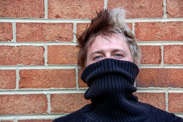 What's the Best Method for Styling a Turtleneck Bodycon Dress in a Professional Manner?